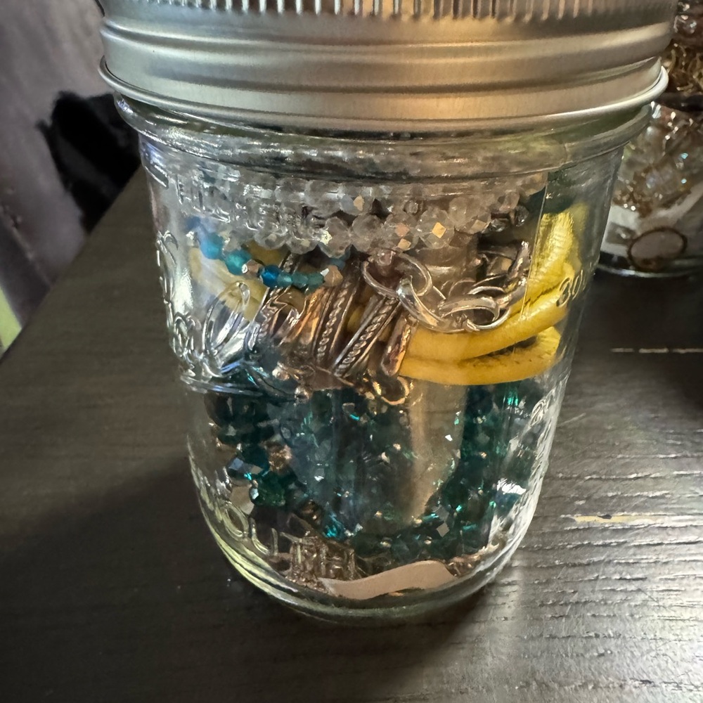 Mason Jar with Assorted Jewelry